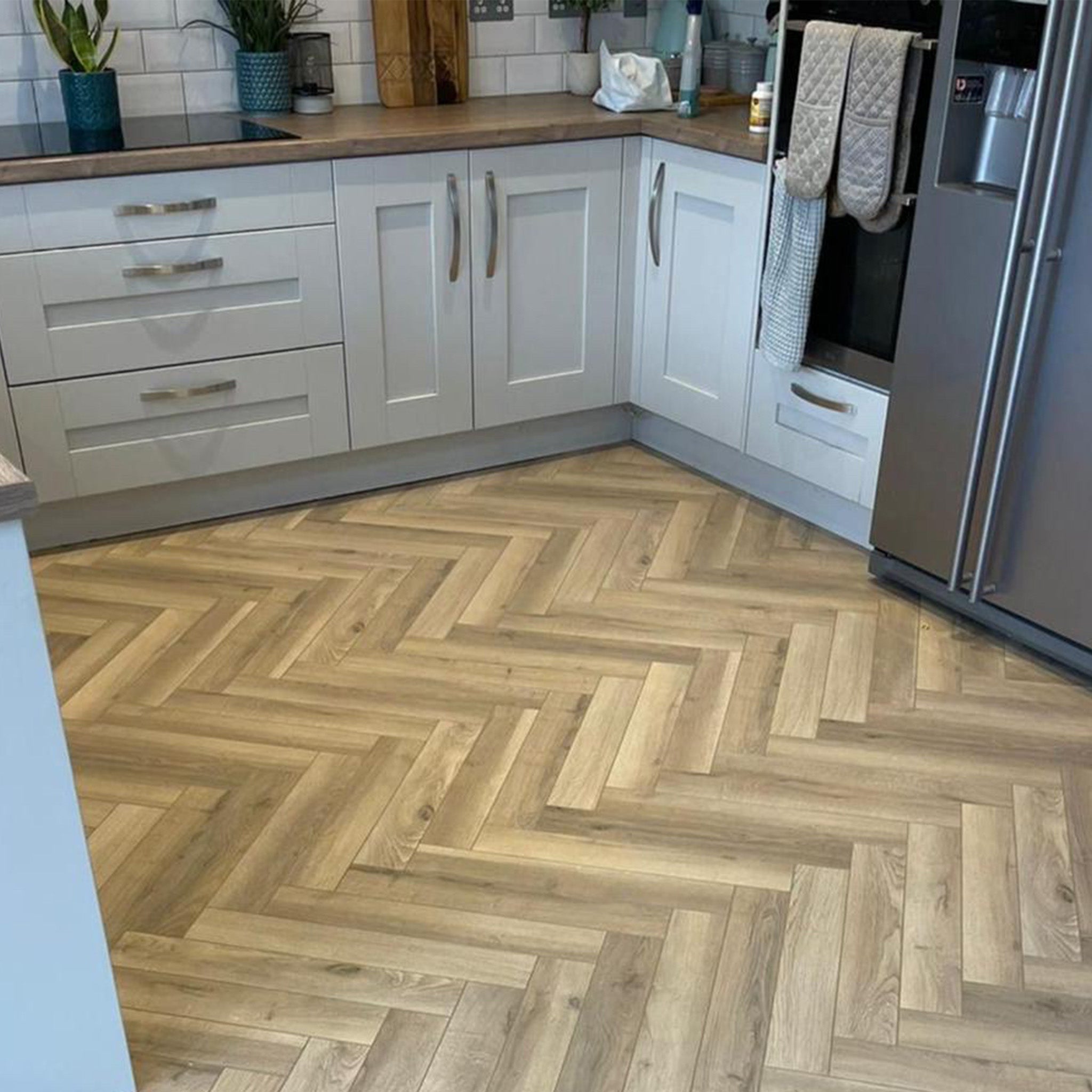 Brooklyn Oak 12mm Herringbone Laminate - Floor Street