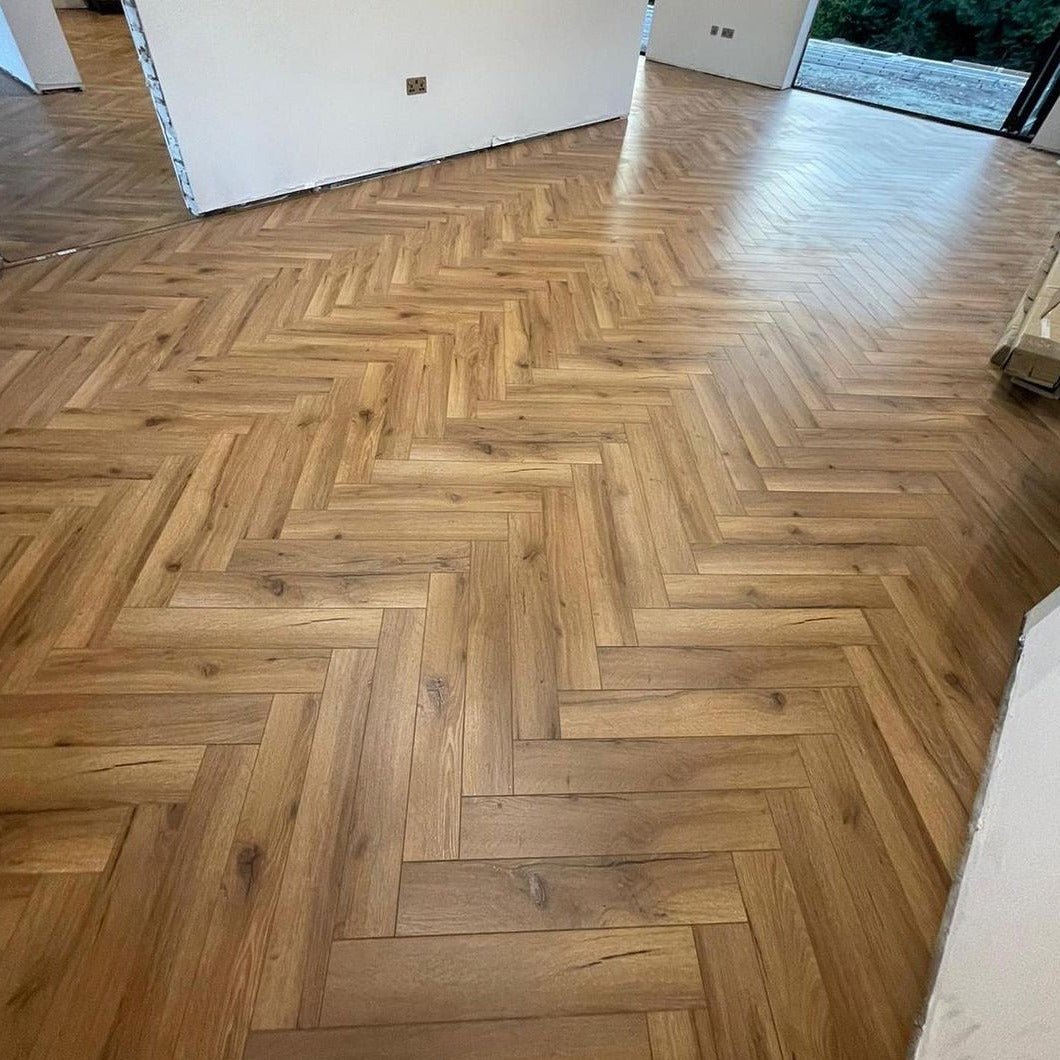Heritage Oak 12mm Herringbone Laminate - Floor Street