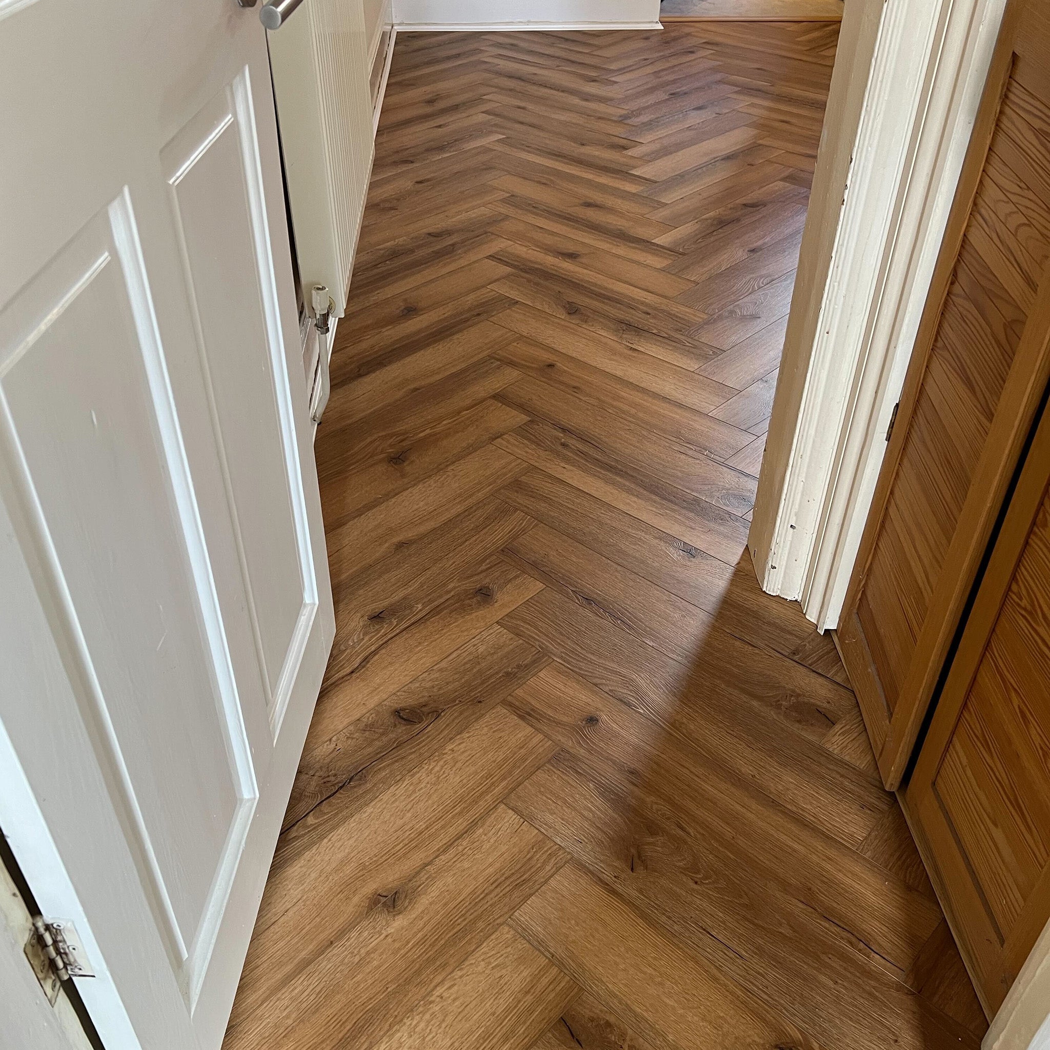 Ikura Oak Herringbone Waterproof Click Vinyl - Floor Street