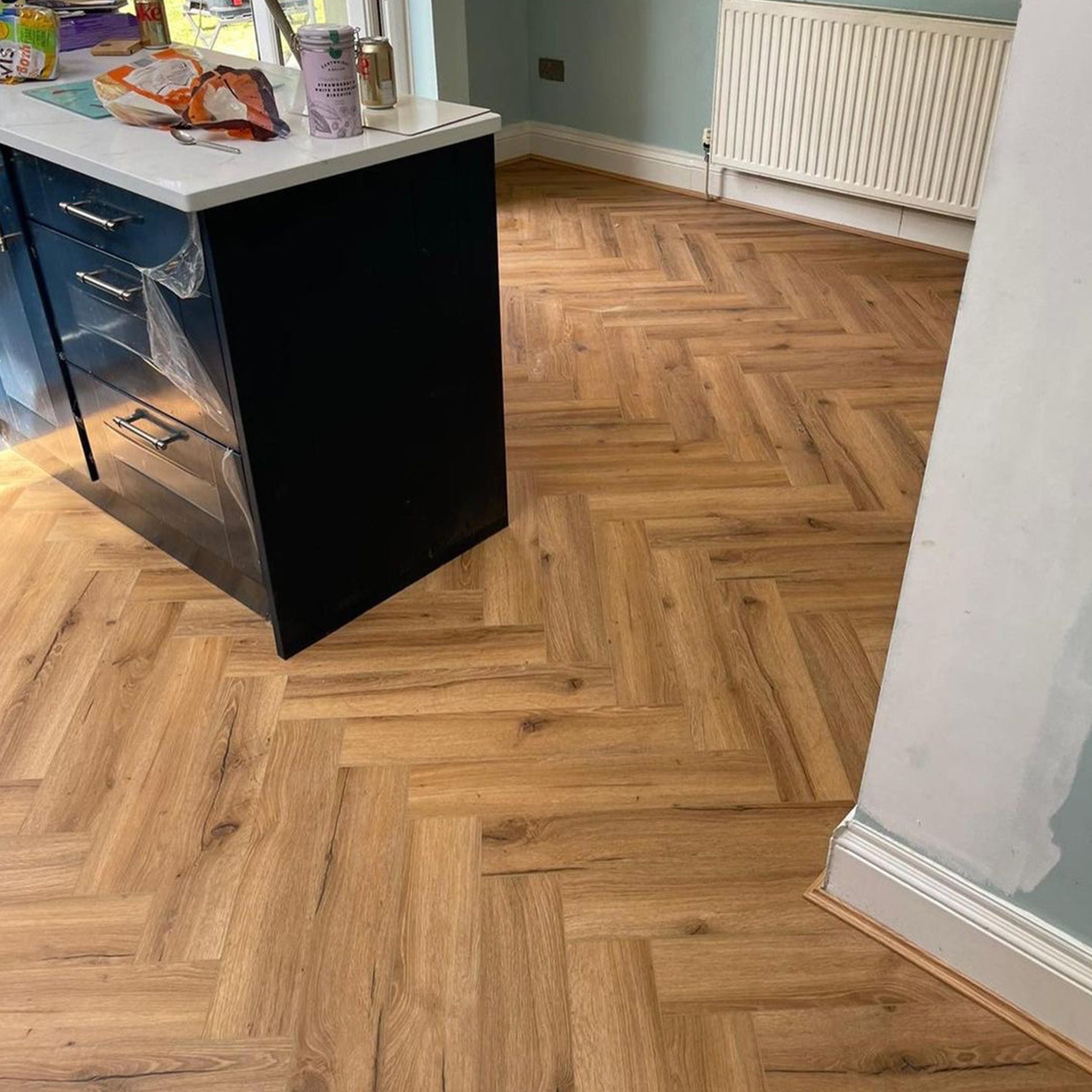 Ikura Oak Herringbone Waterproof Click Vinyl - Floor Street