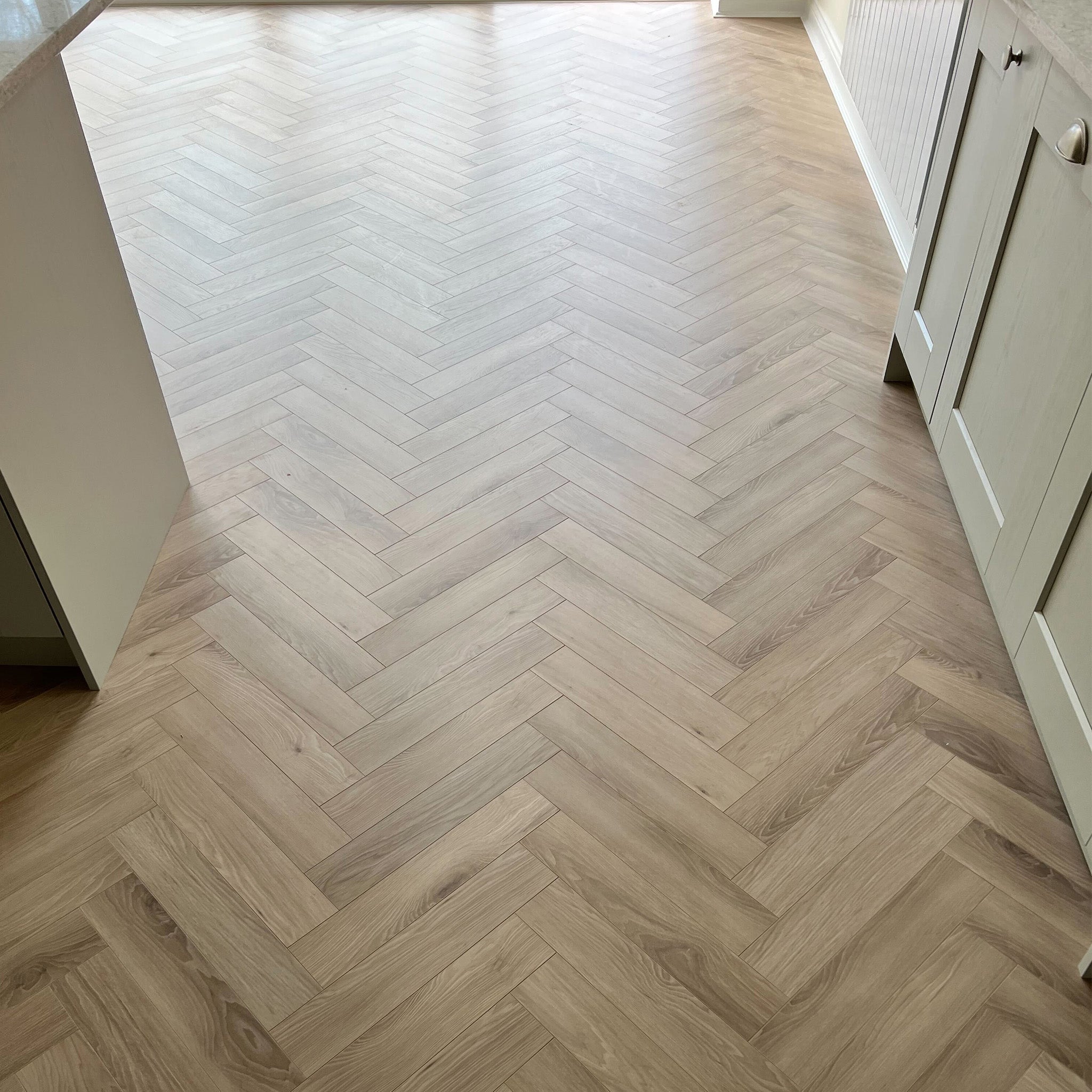 Malmo 12mm Herringbone Laminate - Floor Street