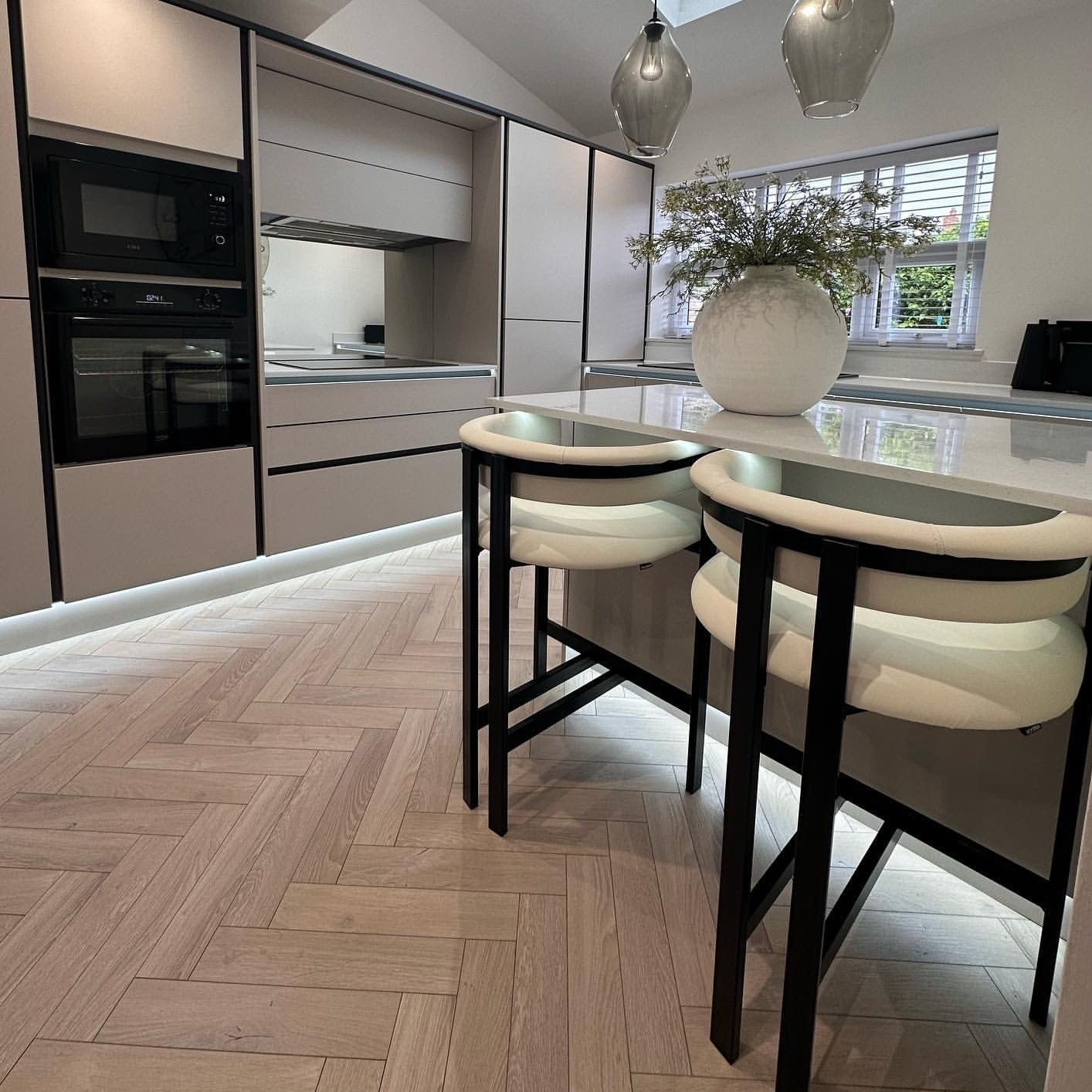 Pearl Oak 12mm Herringbone Laminate - Floor Street