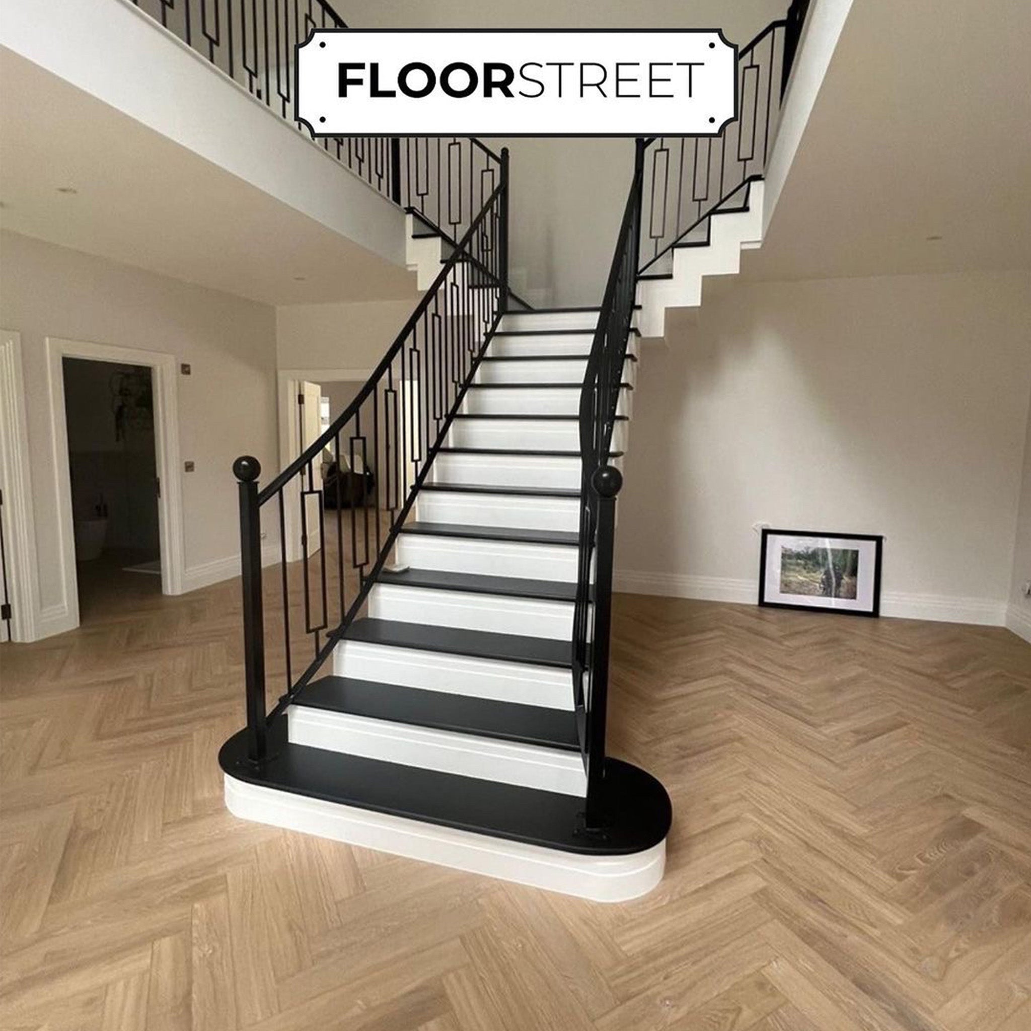 Desert Oak 12mm Herringbone Laminate