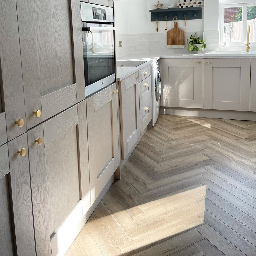 Greige Oak 12mm Herringbone Laminate