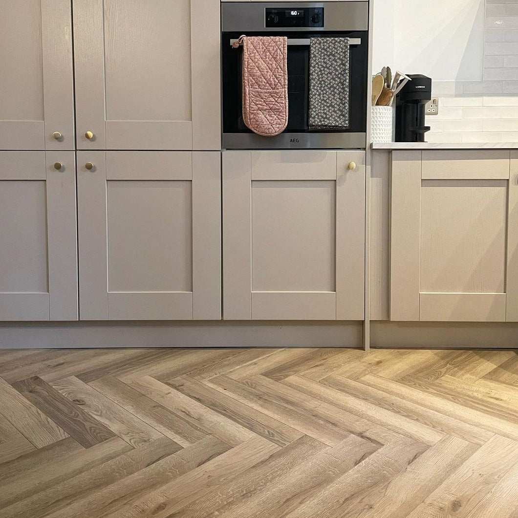 Greige Oak 12mm Herringbone Laminate