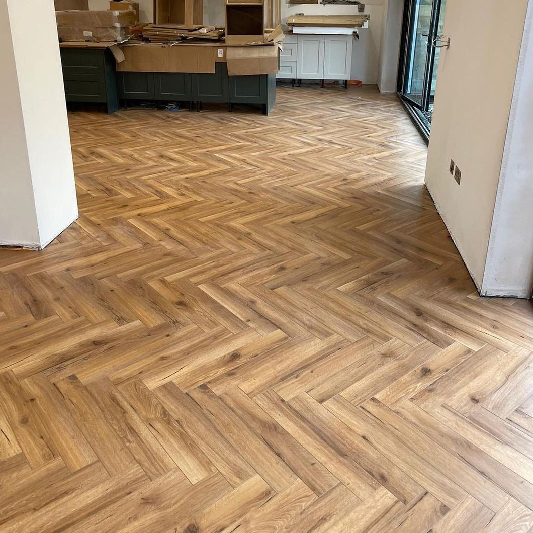 Heritage Oak 12mm Herringbone Laminate