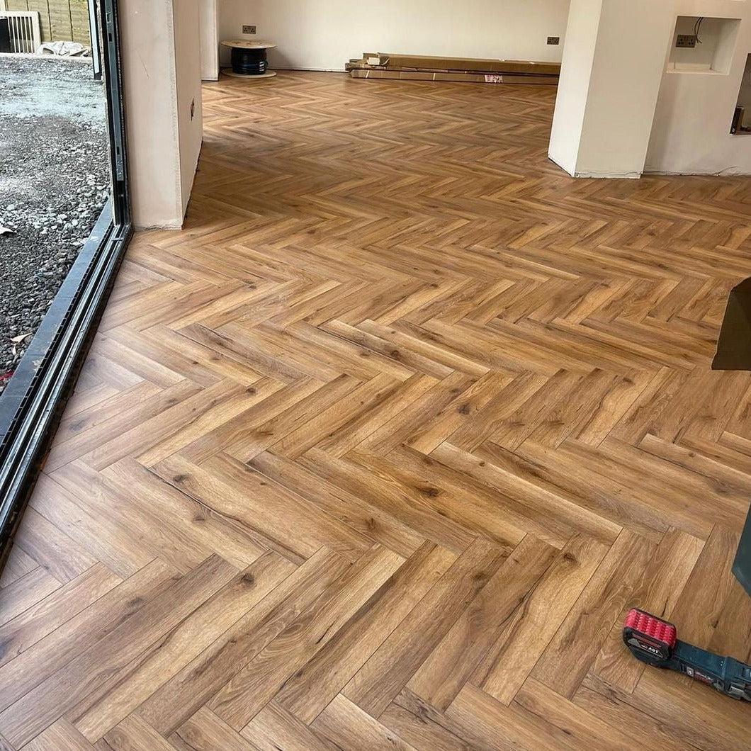 Heritage Oak 12mm Herringbone Laminate