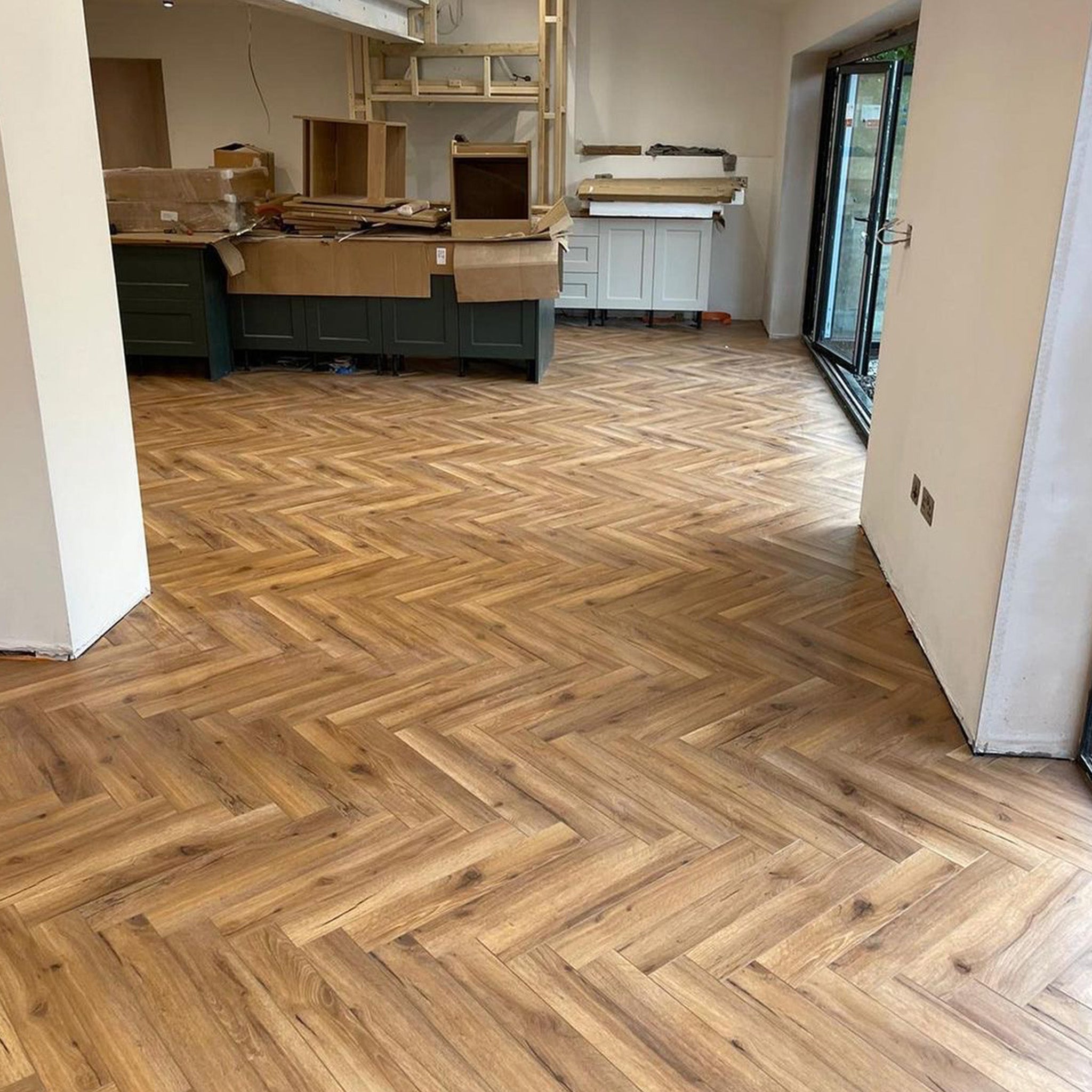 Heritage Oak 12mm Herringbone Laminate