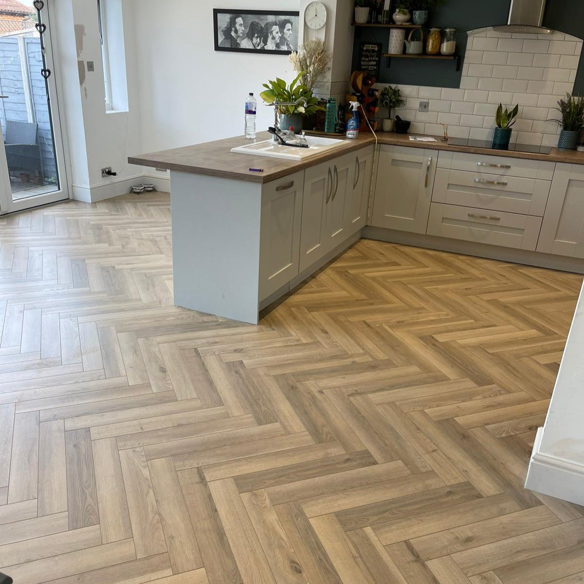Brooklyn Oak 12mm Herringbone Laminate - Floor Street
