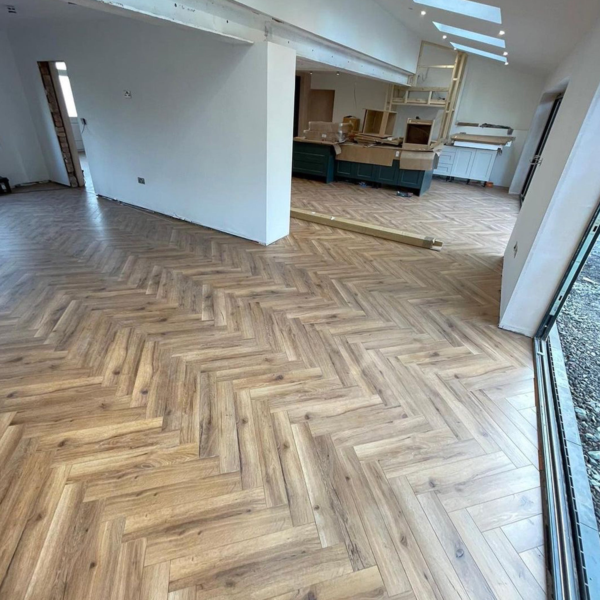 Heritage Oak 12mm Herringbone Laminate - Floor Street