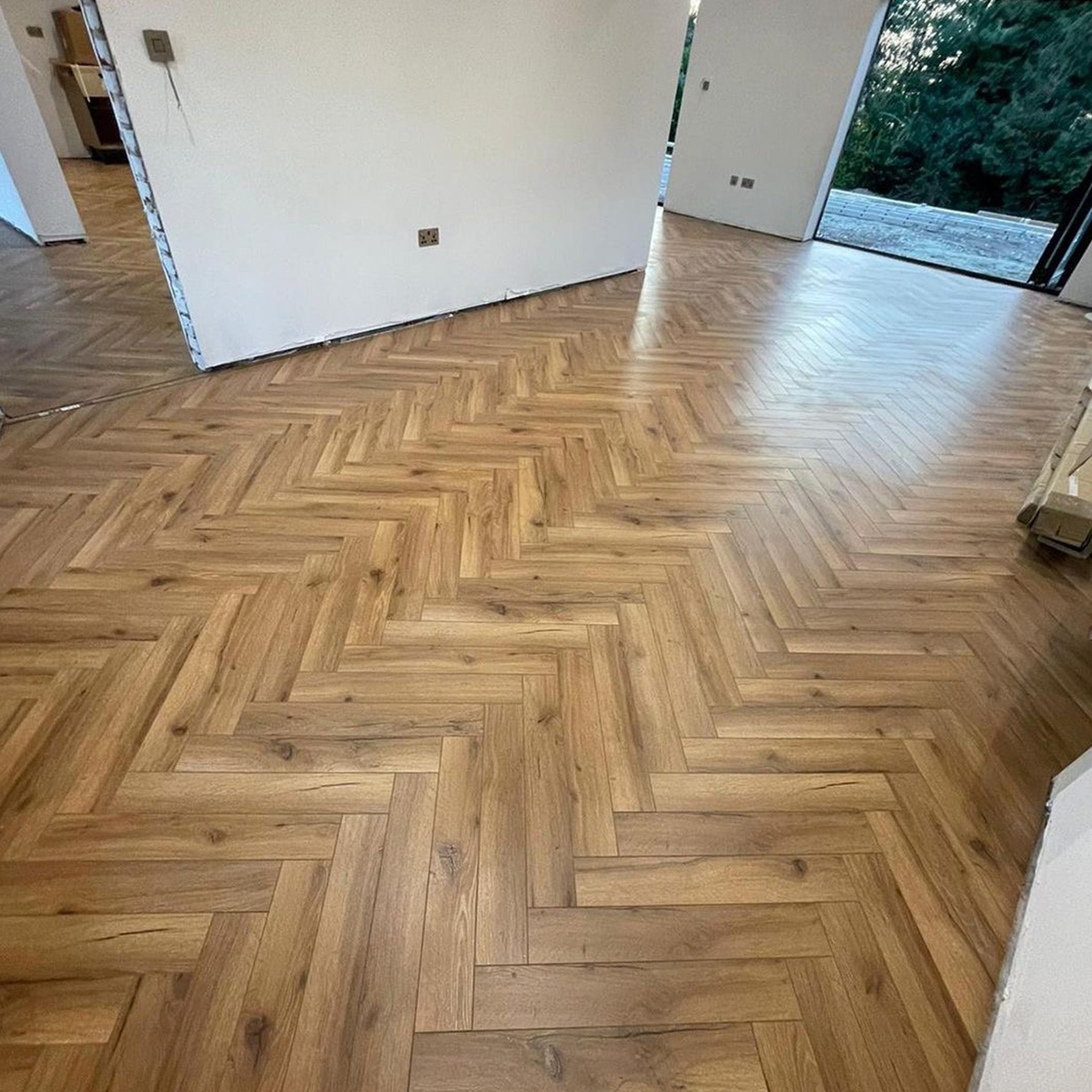 Heritage Oak 12mm Herringbone Laminate - Floor Street
