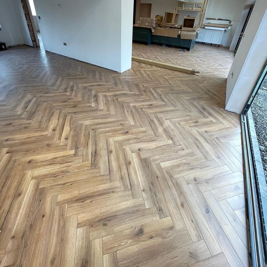 Heritage Oak 12mm Herringbone Laminate - Floor Street