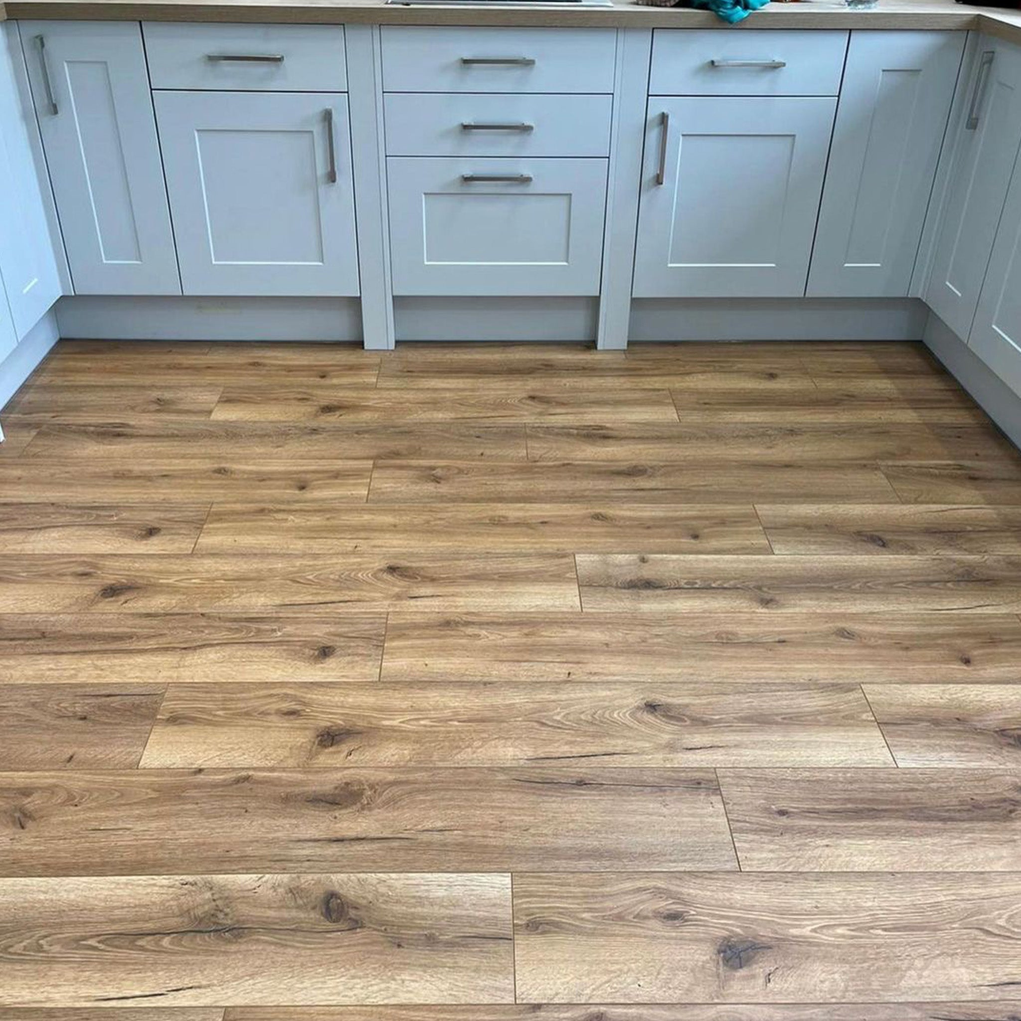 Heritage Oak 12mm Senior Straight Laminate - Floor Street