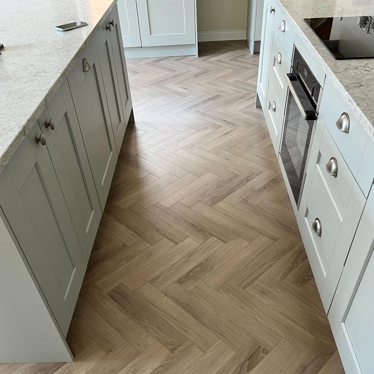 Malmo 12mm Herringbone Laminate - Floor Street