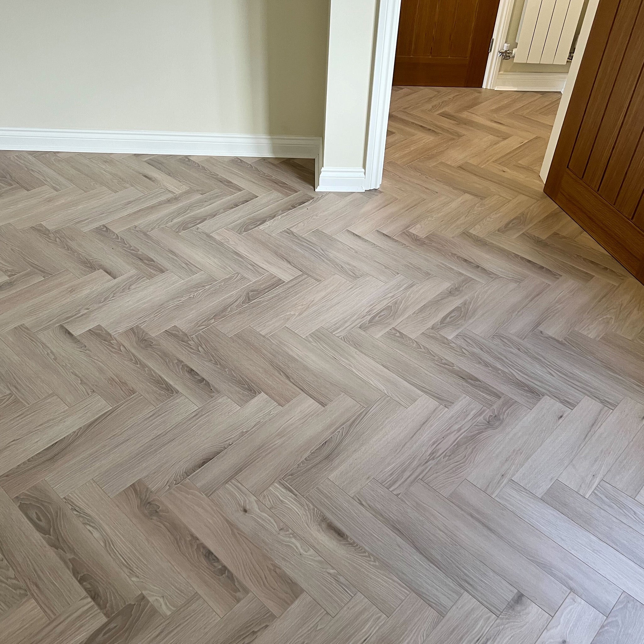 Malmo 12mm Herringbone Laminate - Floor Street