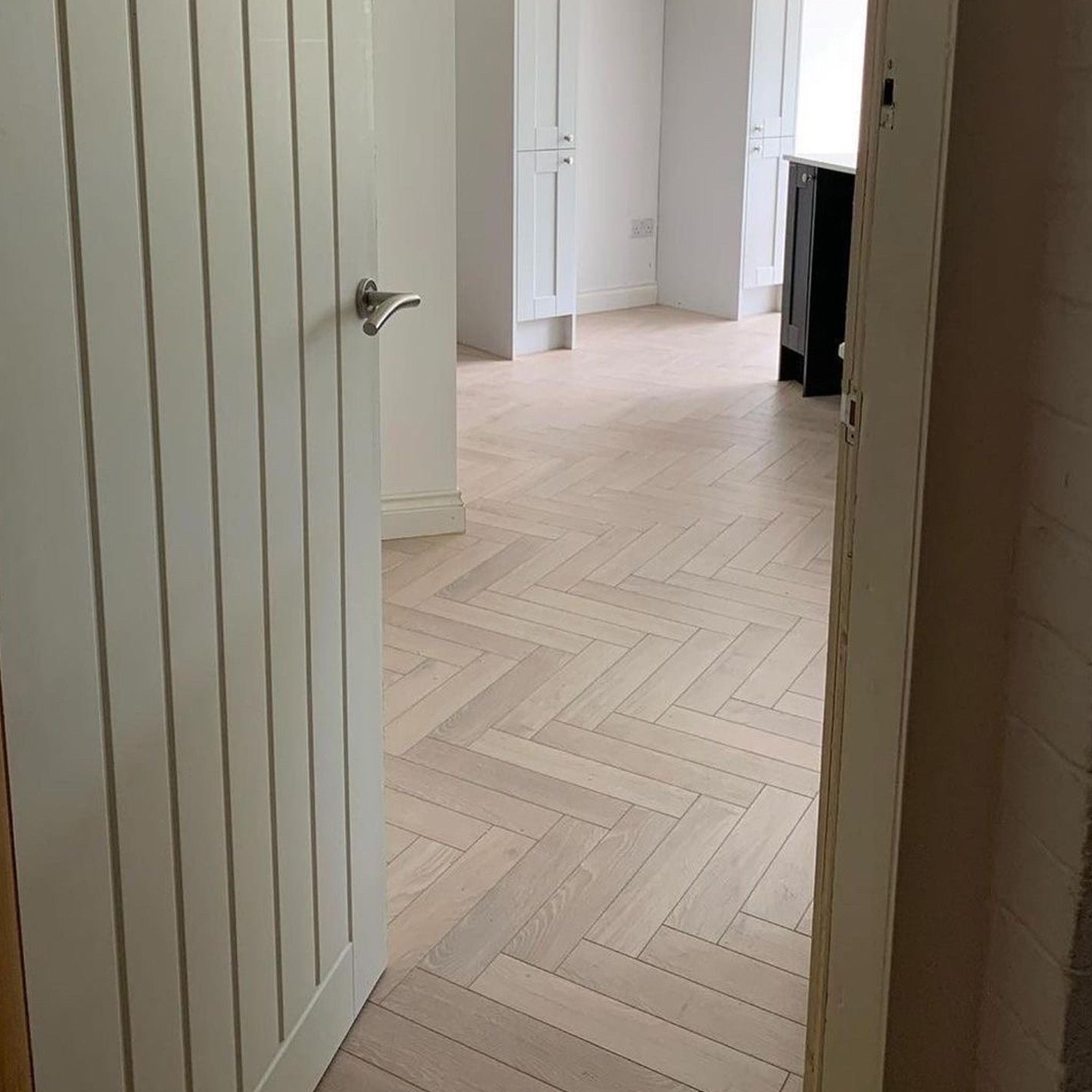 Pearl Oak 12mm Herringbone Laminate