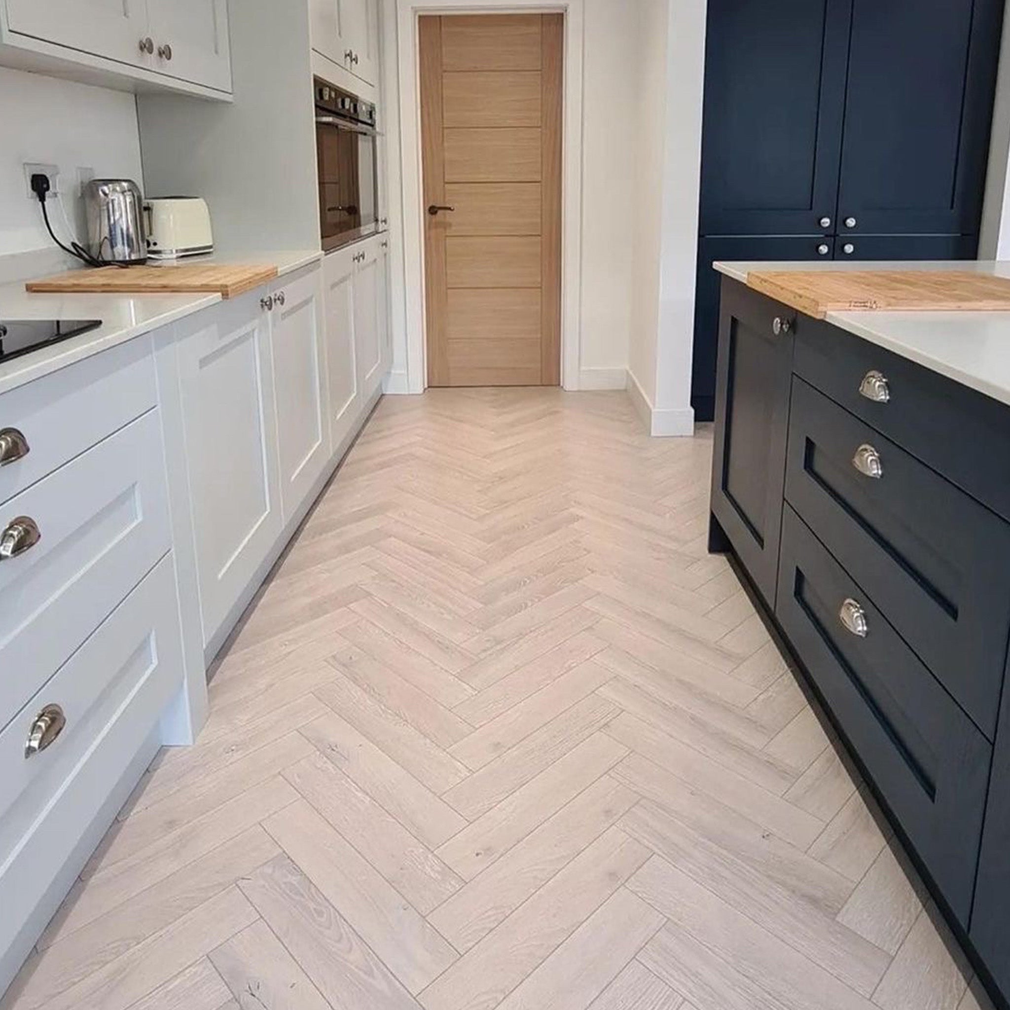 Pearl Oak 12mm Herringbone Laminate